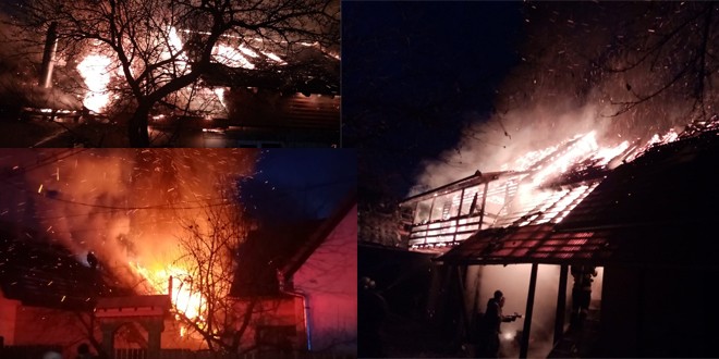 Zeci de pompieri militari și civili au intervenit pentru stingerea unui puternic incendiu izbucnit la o casă de locuit